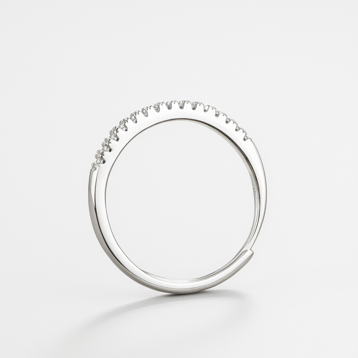 Close-up of EverFlex™ adjustable pavé wedding band with Cubic Zirconia stones and hidden flex-fit mechanism