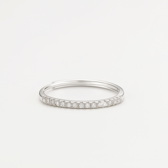 Close-up of EverFlex™ adjustable pavé wedding band with Cubic Zirconia stones and hidden flex-fit mechanism