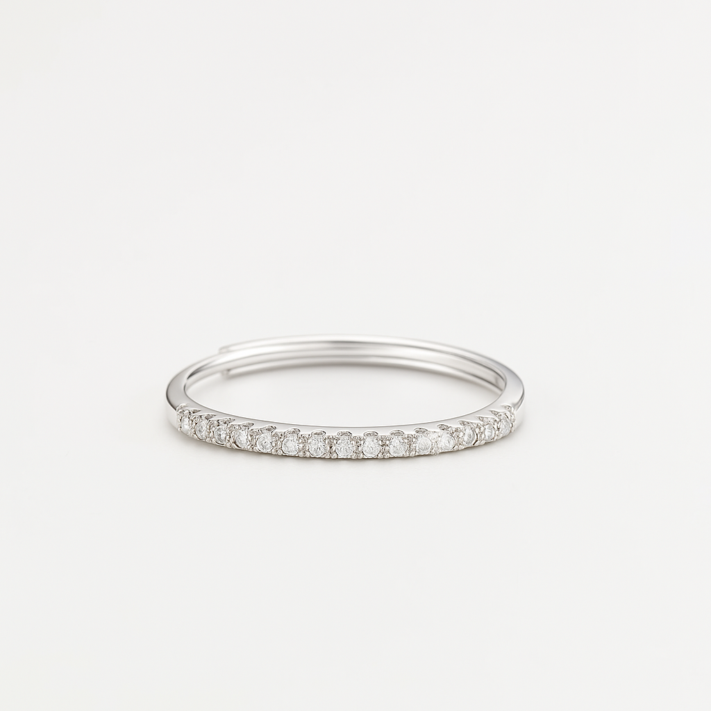Close-up of EverFlex™ adjustable pavé wedding band with Cubic Zirconia stones and hidden flex-fit mechanism